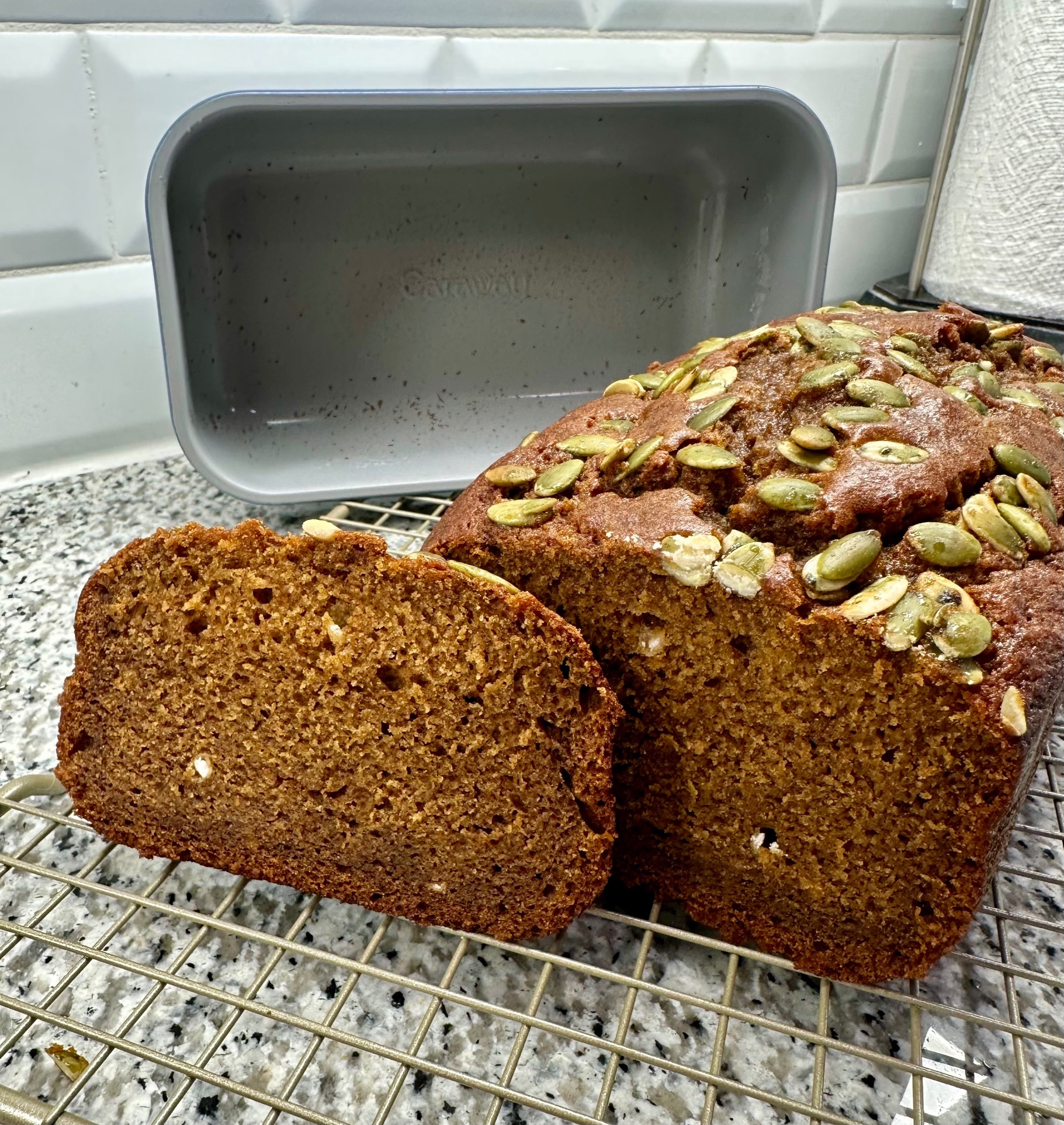 Sliced pumpkin bread showing moist crumb