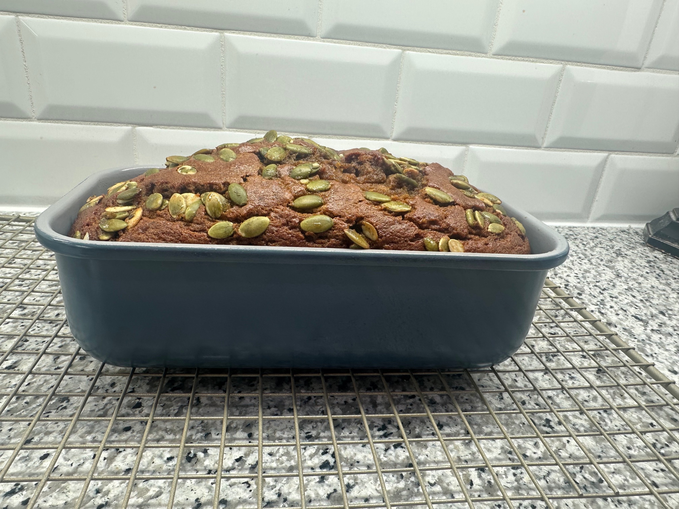 Pumpkin bread risen high in a Caraway loaf pan