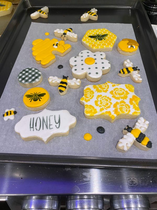 Boxed bee set: Kathy's first decorated cookie set before she started selling — a boxed dozen of bee and honey themed cookies made for her beekeeper mother-in-law