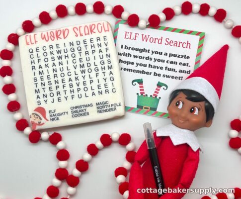 Elf on the Shelf doll with an edible word search cookie, printable staging card, and edible ink marker