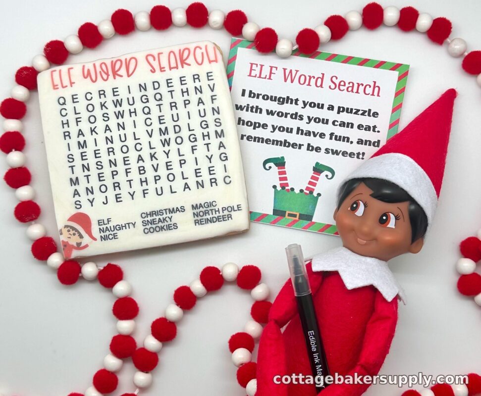 Elf on the Shelf doll with an edible word search cookie, printable staging card, and edible ink marker