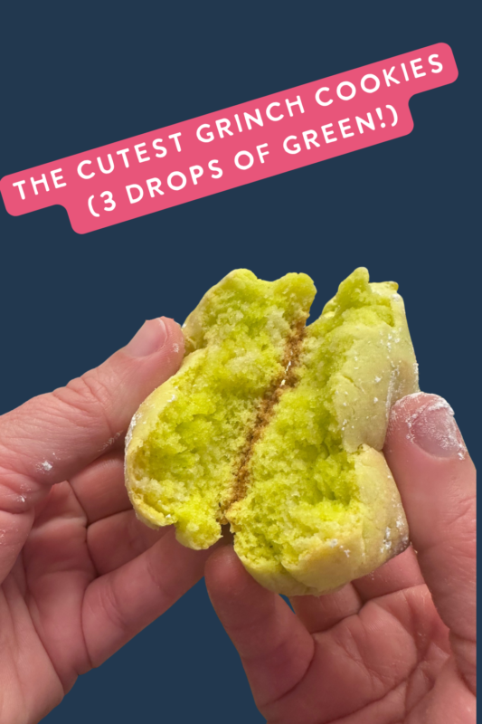 Freshly baked Grinch crinkle cookies with vibrant green color and red heart sprinkles