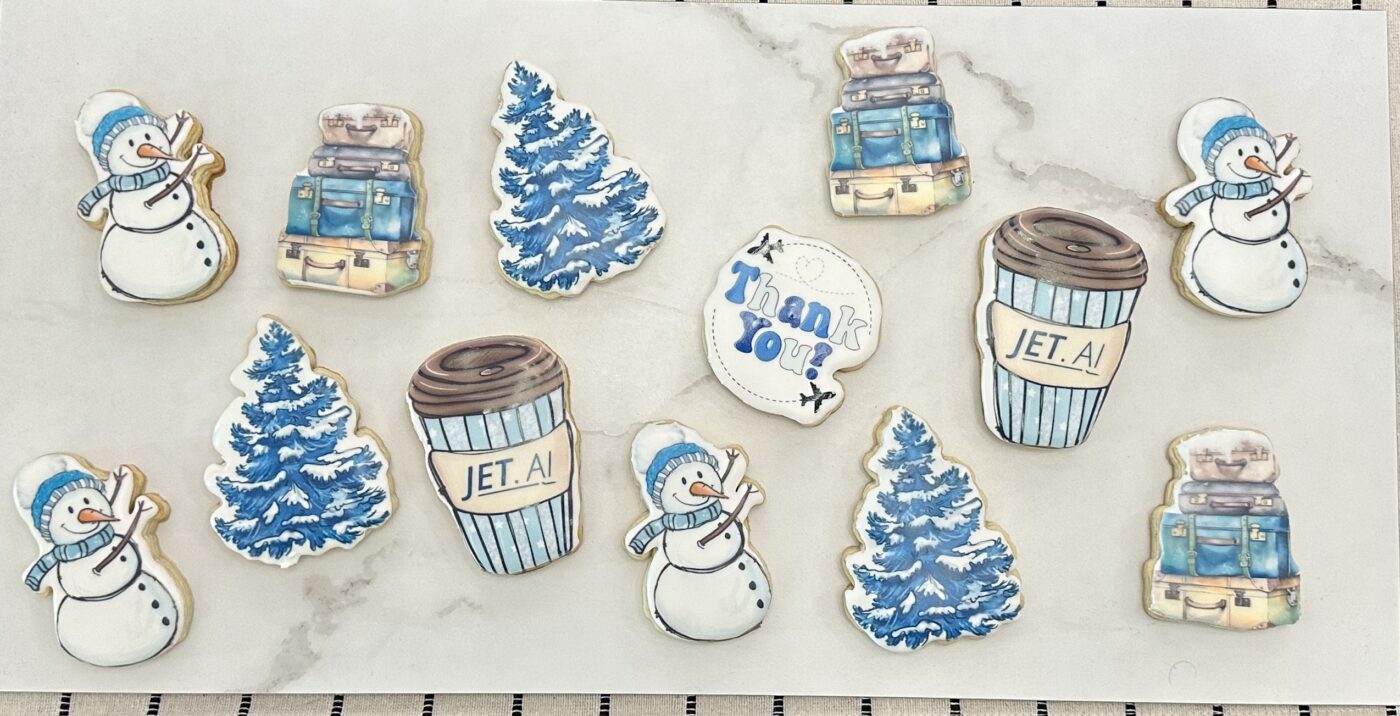 Ski adventure cookie set with personalized coffee cups, snowmen, winter trees, luggage and thank you cookie printed with Eddie printer