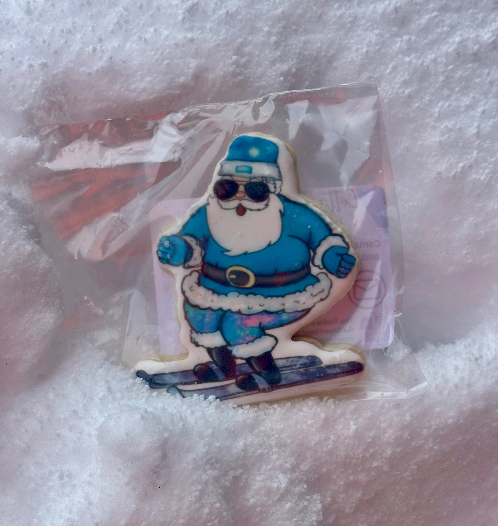 Ski Santa cookie in the snow